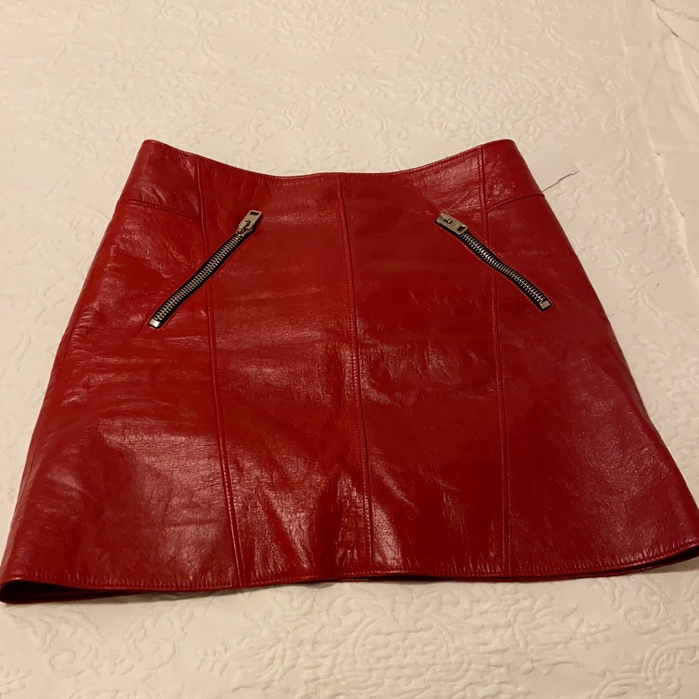 Red leather Coach mini skirt
